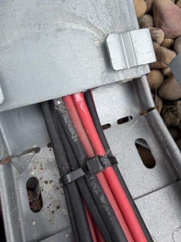 Damaged DC cable insulation inside the containment.